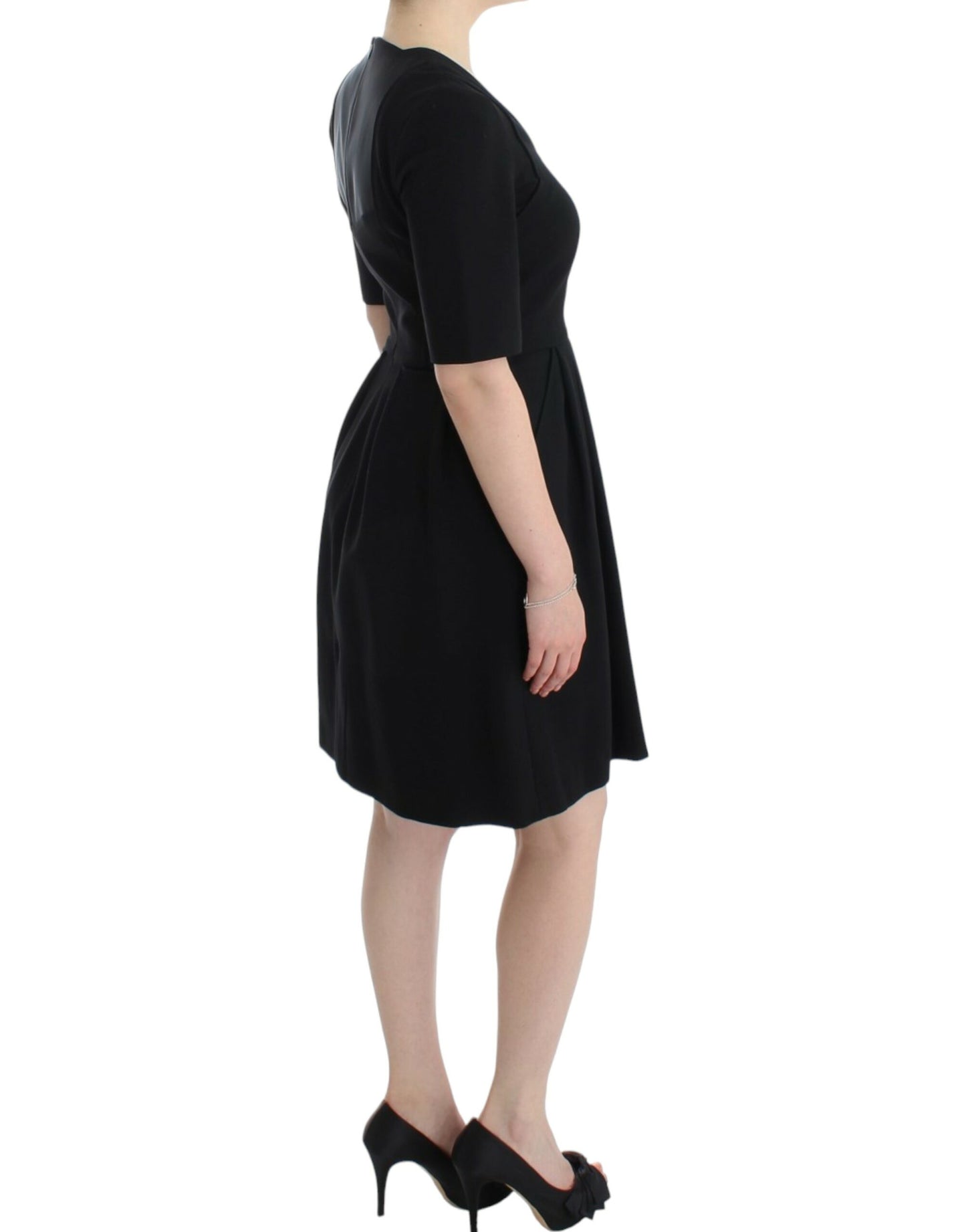 CO|TE Black short sleeve venus dress